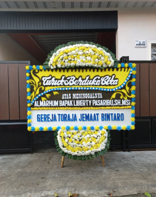 Papan Bunga Duka di Wek V